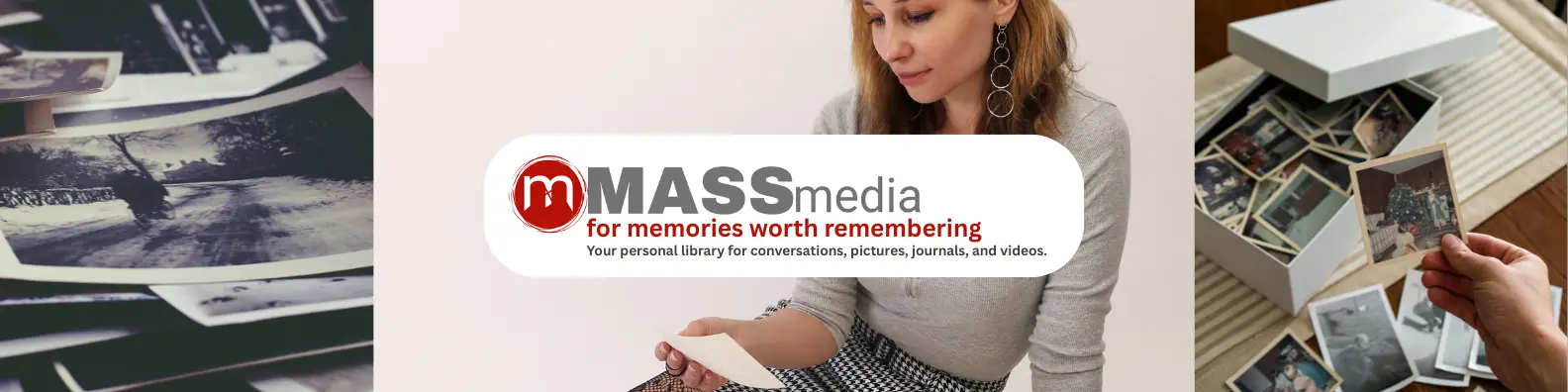 Woman looking at old photographs with stacks of photos on a table.
